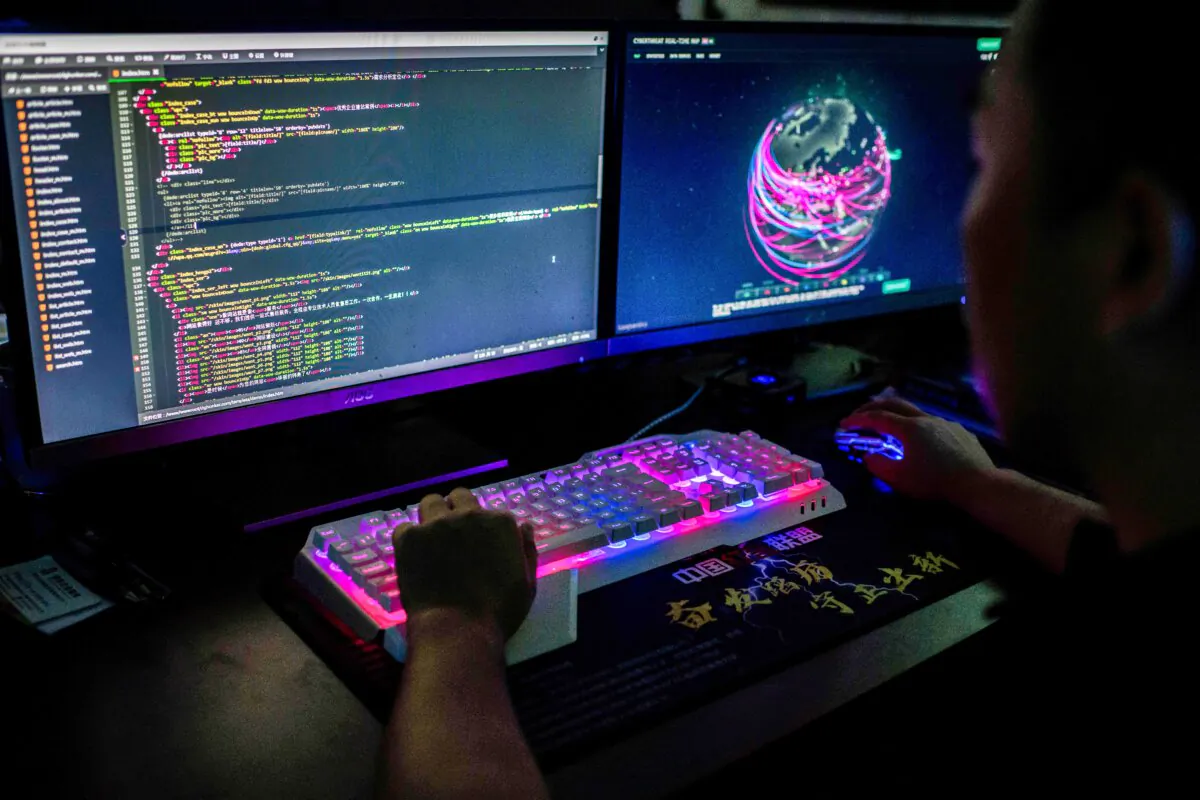 A hacker uses his computer in Dongguan, Guangdong Province, China, on Aug. 4, 2020. (Nicolas Asfouri/AFP via Getty Images)