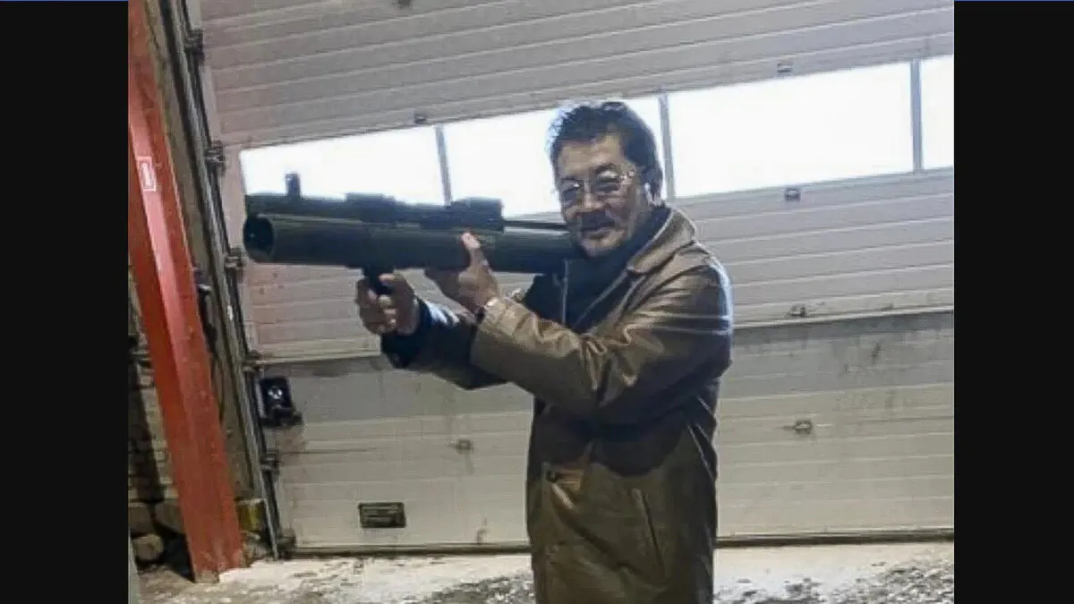 Takeshi Ebisawa handling a rocket launcher at a meeting with undercover U.S. agents on Feb. 3, 2021. (U.S. Department of Justice photo/Released)