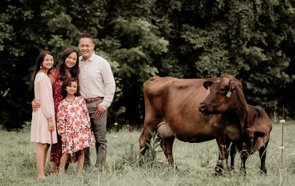 Vietnamese American homesteader Sophia Nguyen Eng with her husband, Tim, and her two daughters, Emily and Natalie, at their farm in eastern Tennessee. (Neeli Brisky)