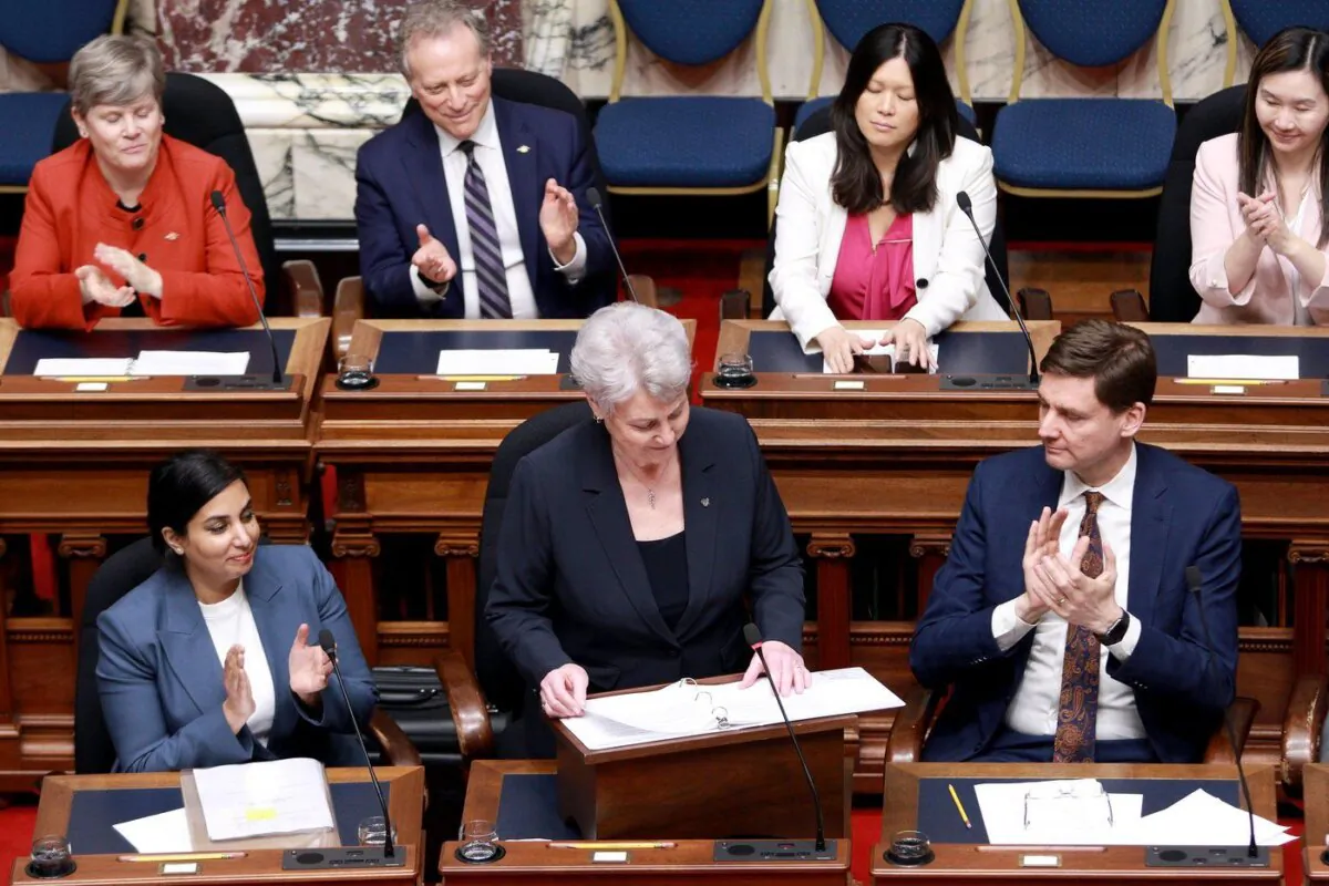 B.C. Finance Minister Katrine Conroy tables the budget in the legislative assembly at the legislature in Victoria on Feb. 22, 2024. (The Canadian Press/Chad Hipolito)