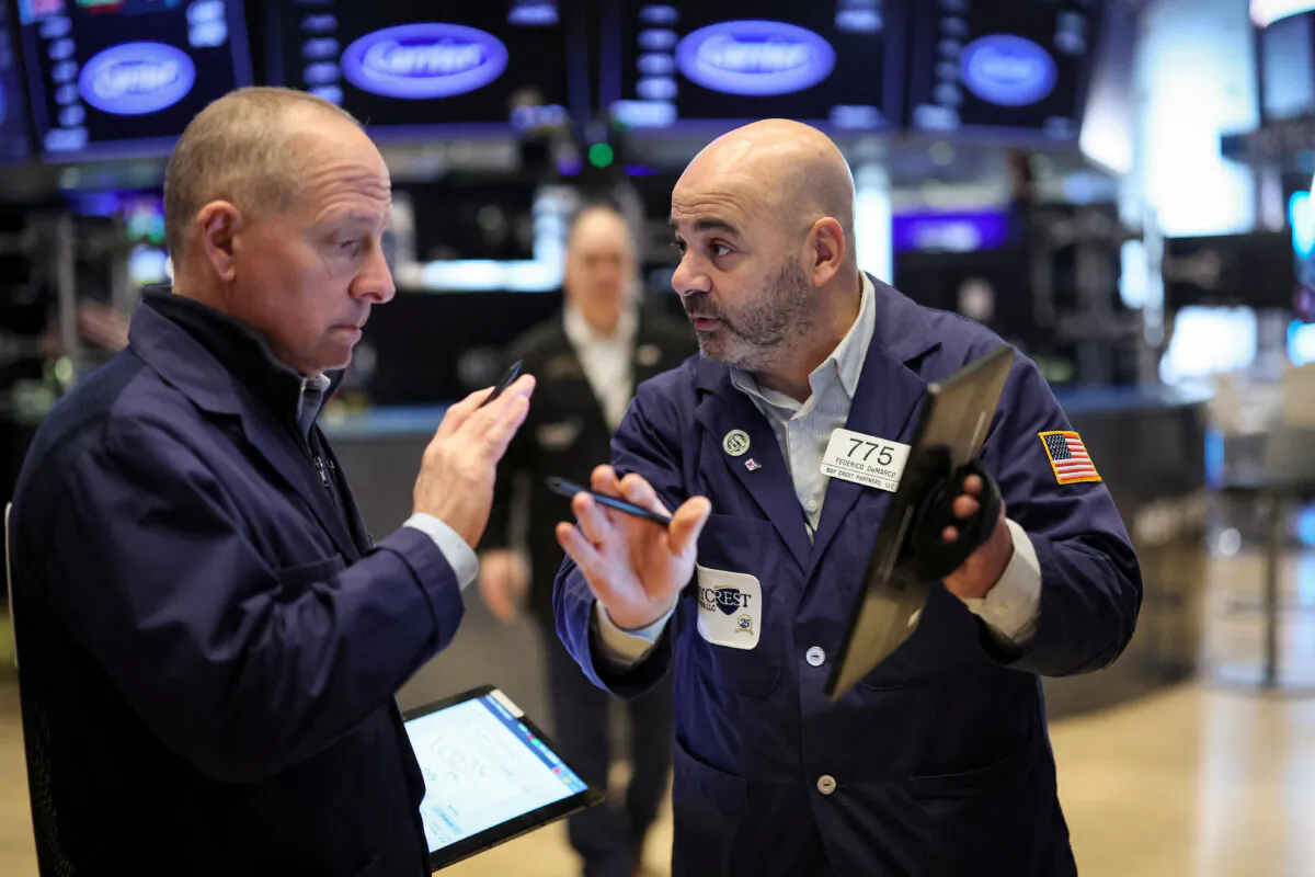Traders work on the floor at the New York Stock Exchange (NYSE) in New York City, on Feb. 6, 2024. (Brendan McDermid/Reuters)