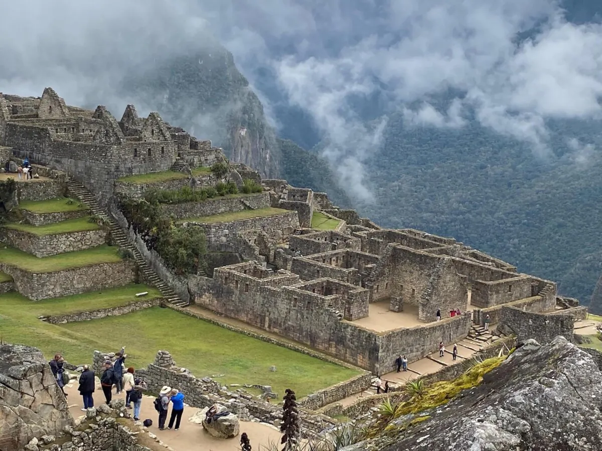 Tourists walk along the paths of the ruins of Machu Picchu in Peru in September 2023. (Colleen Thomas/TNS)
