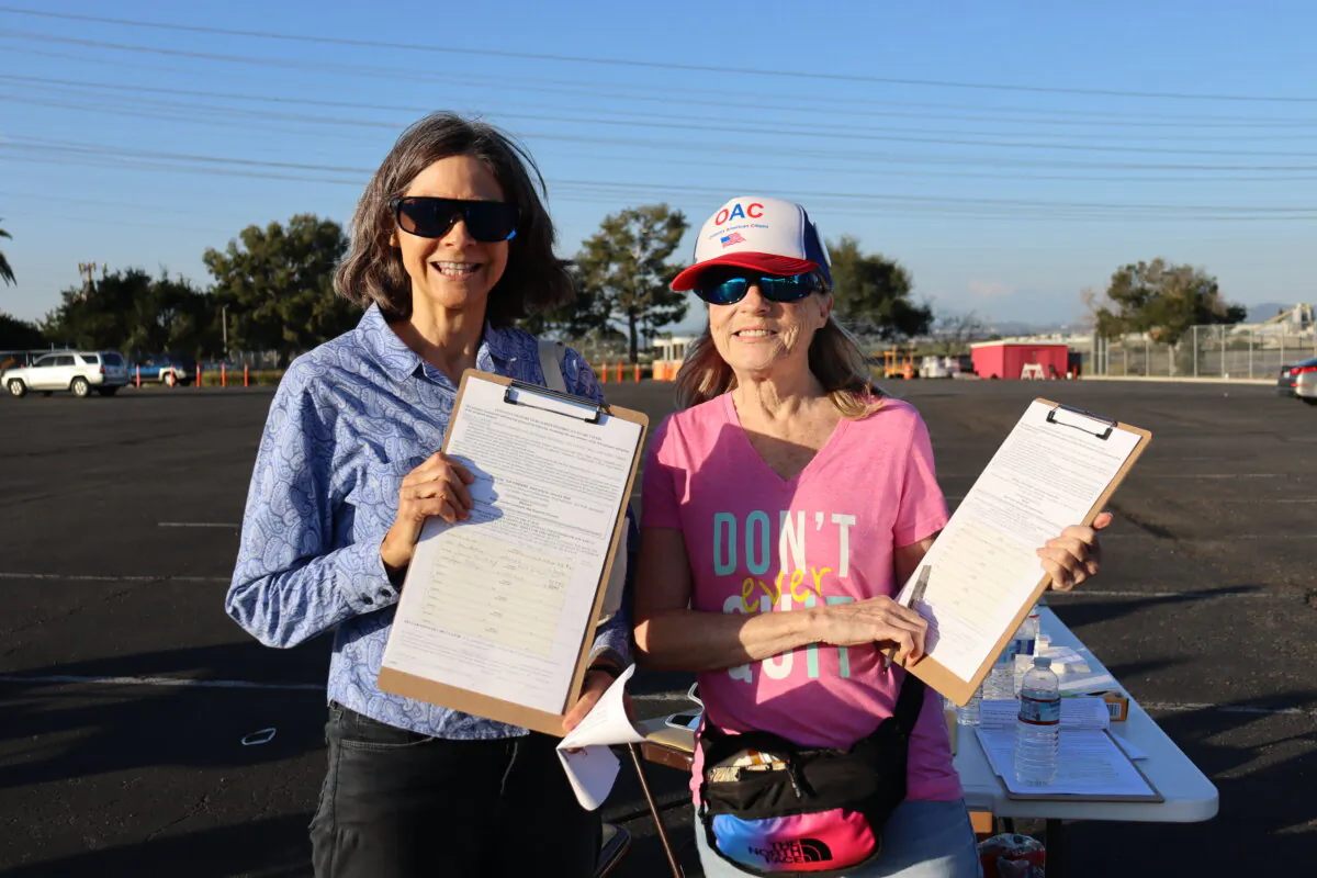 Local residents attend a Proposal 47 reform signature collection drive-thru event hosted by KFI radio at the Honda Center in Anaheim, Calif., on Feb. 22, 2024. (Mei He/The Epoch Times)