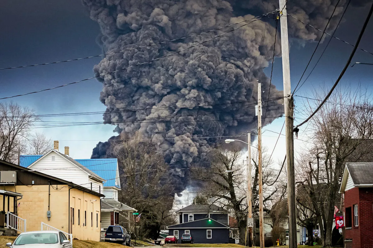 An East Palestine, Ohio, neighborhood near the controlled detonation of chemicals in the derailed Norfolk Southern train, on Feb. 6, 2023. (Gene J. Puskar/AP)