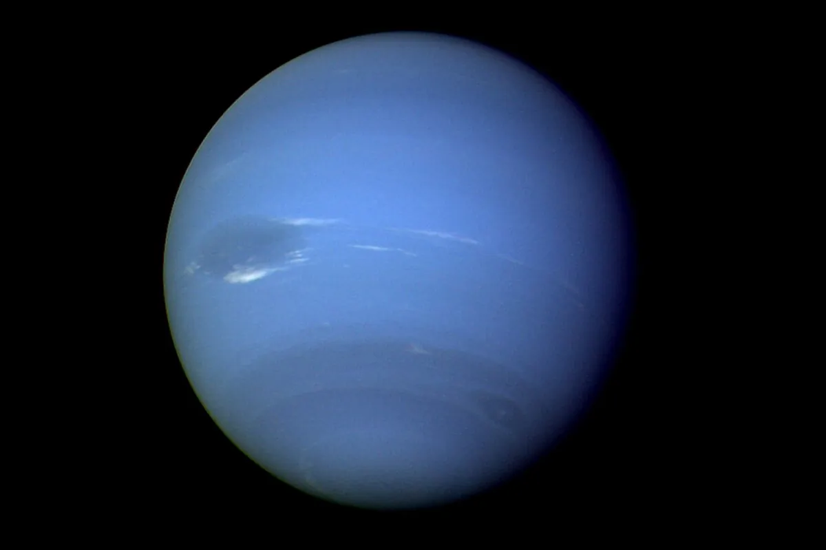 The planet Neptune photographed by the Voyager 2 spacecraft in August 1989, processed to enhance the visibility of small features. (NASA via AP)