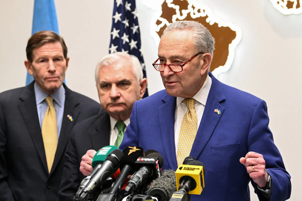 U.S. Senate Majority Leader Chuck Schumer (R) delivers a press conference following his meeting with Ukraine's President in Lviv on Feb. 23, 2024. (Yuriy Dyachyshyn/AFP via Getty Images)