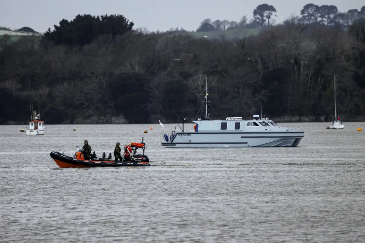 Handout photo issued by the Ministry of Defence (MOD) of the Royal Navy Bomb Disposal Team leaving the slip to Torpoint Ferry as they dispose of the WWII bomb discovered in Keyham in Plymouth on Feb. 23, 2024. (LPhot Barry Swainsbury/MOD Crown /PA)
