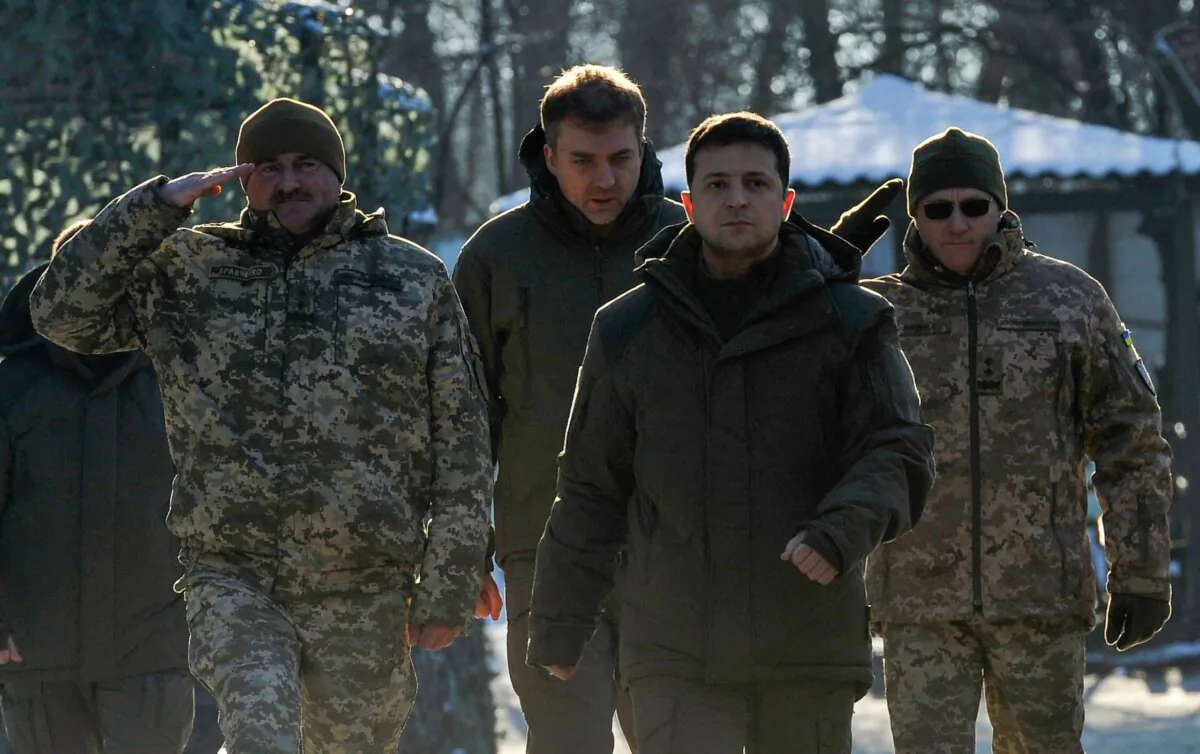 Ukrainian President Volodymyr Zelenskyy meets with servicemen while visiting the Donetsk region in Ukraine on Dec. 6, 2019. (EVGENIYA MAKSYMOVA/AFP via Getty Images)