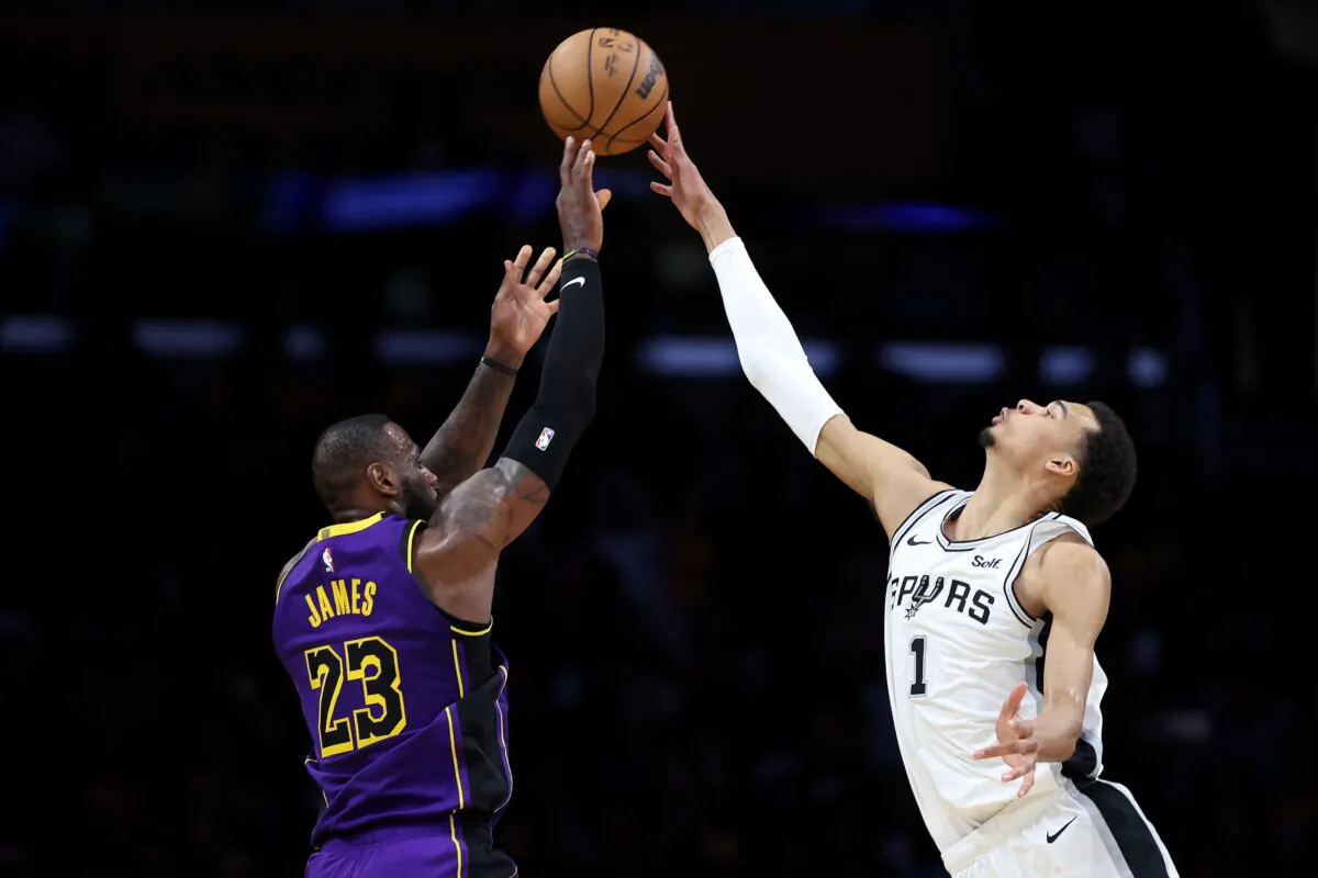 Victor Wembanyama (1) of the San Antonio Spurs blocks a shot by LeBron James (23) of the Los Angeles Lakers during the second half of a game in Los Angeles on Feb. 23, 2024. (Sean M. Haffey/Getty Images)