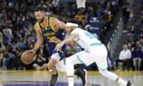 Warriors Hold Off Hornets in Defensive Struggle