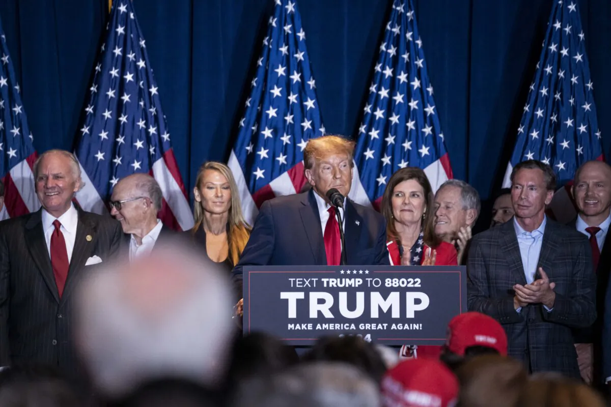 President Donald Trump takes the stage at the South Carolina State Fairgrounds in Columbia, S.C., after defeating Nikki Haley in her home state on Feb. 24, 2024. (Madalina Vasiliu/The Epoch Times)