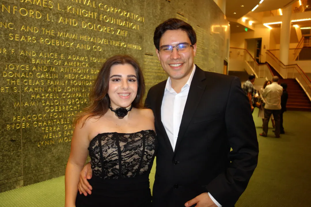 Isabella Panizza and Cesar Gadea-Gonzalez 
 enjoyed Shen Yun at the Adrienne Arsht Center for the Performing Arts on Feb. 24, 2024. (Lily Yu/The Epoch Times)