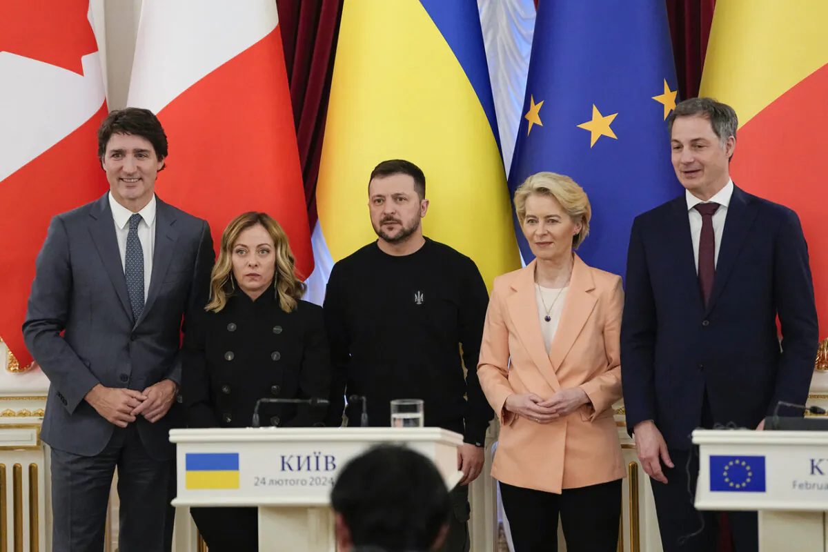 (L–R) Prime Minister Justin Trudeau, Italian Premier Giorgia Meloni, Ukrainian President Volodymyr Zelenskyy, EU Commission President Ursula von der Leyen, and Belgian Prime Minister Alexander De Croo pose for a photo during a meeting with media at Mariinsky Palace in Kyiv, Ukraine, on Feb. 24, 2024. Western leaders were in the Ukrainian capital to mark the second anniversary of Russia’s invasion. (AP Photo/Efrem Lukatsky)