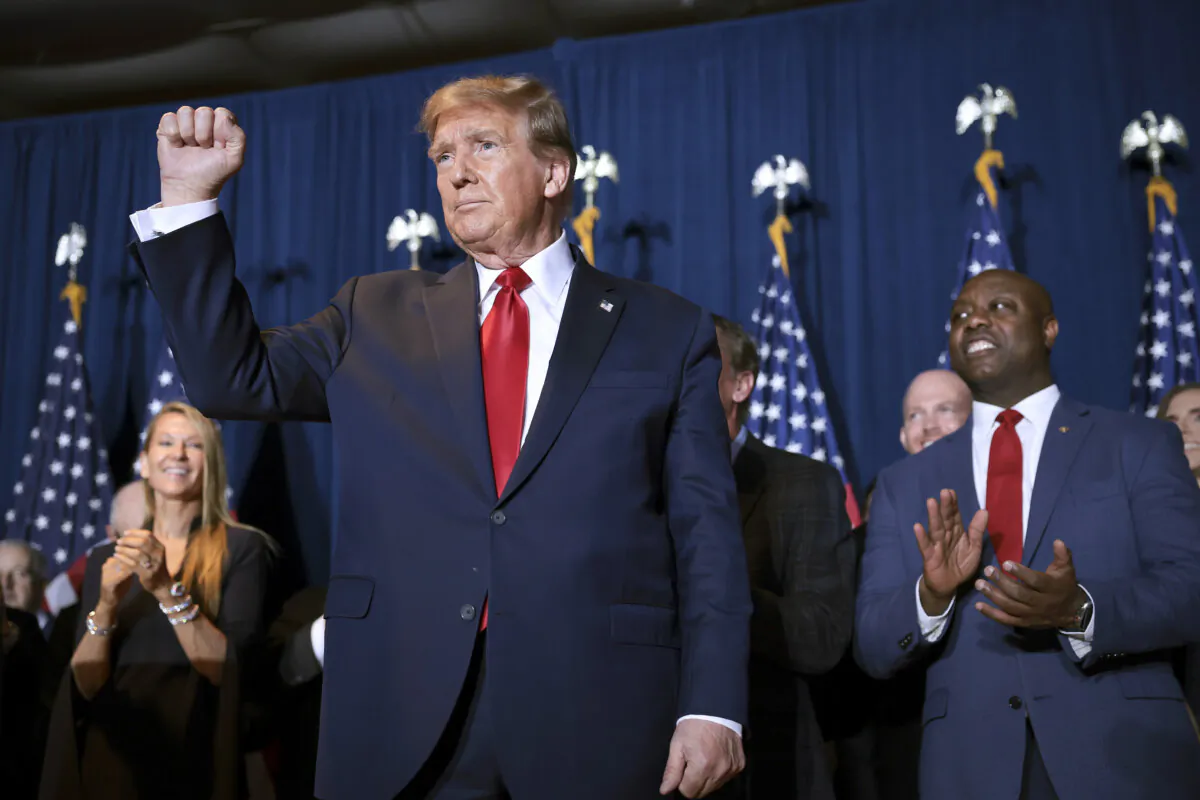 Republican presidential candidate and former President Donald Trump gestures to supporters during an election night watch party at the State Fairgrounds in Columbia, S.C., on Feb. 24, 2024. (Win McNamee/Getty Images)