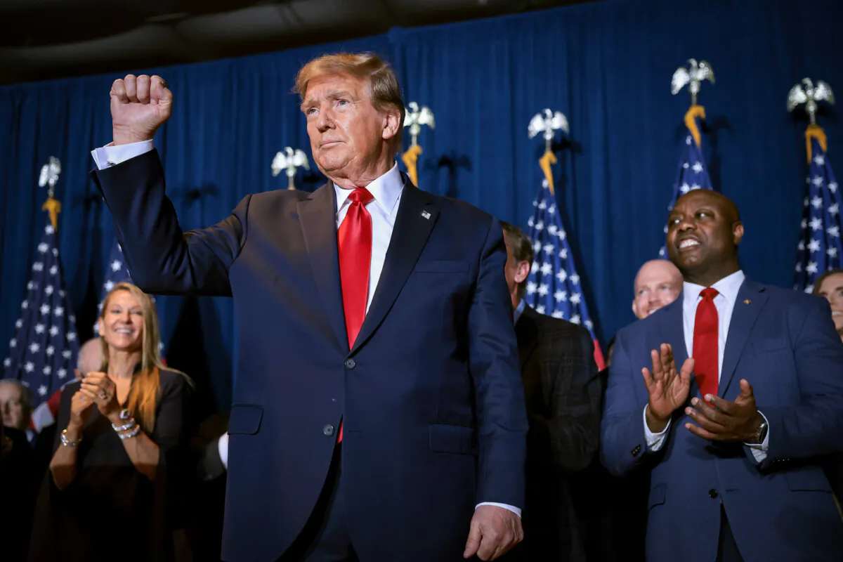 Republican presidential candidate and former President Donald Trump gestures to supporters during an election night watch party at the State Fairgrounds in Columbia, S.C., on Feb. 24, 2024. (Win McNamee/Getty Images)