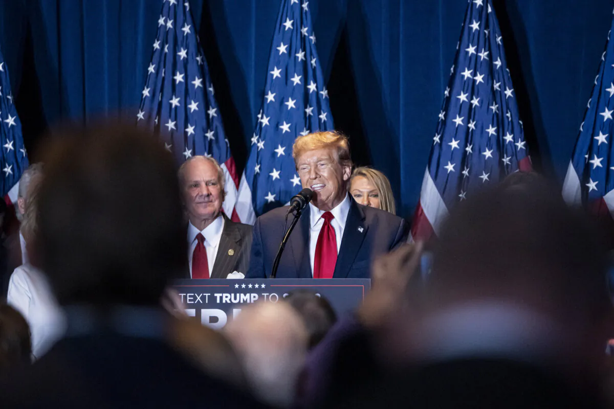 President Donald Trump takes the stage at the South Carolina State Fairgrounds in Columbia, S.C., after defeating Nikki Haley in her home state on Feb. 24, 2024. (Madalina Vasiliu/The Epoch Times)