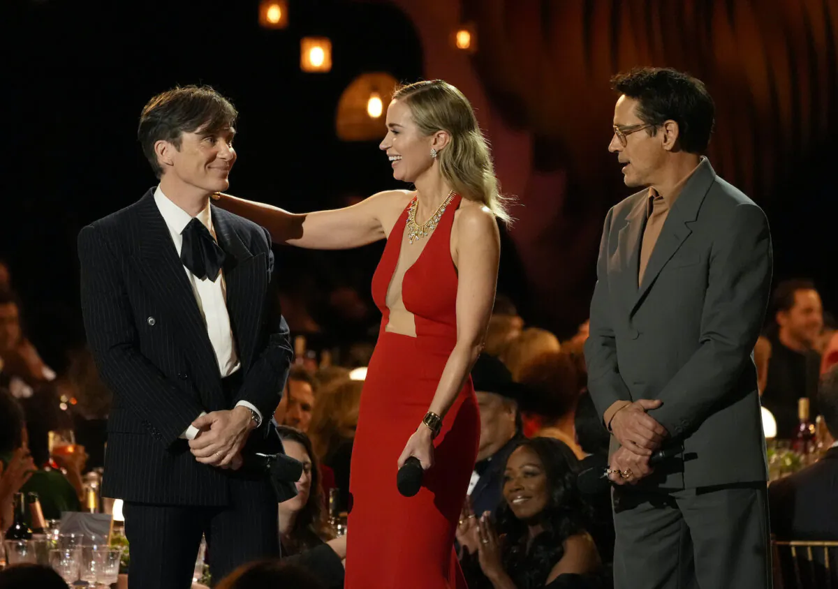 Cillian Murphy, from left, Emily Blunt, and Robert Downey Jr., present a segment from "Oppenheimer" during the 30th annual Screen Actors Guild Awards at the Shrine Auditorium in Los Angeles on Feb. 24, 2024. (Chris Pizzello/AP Photo)