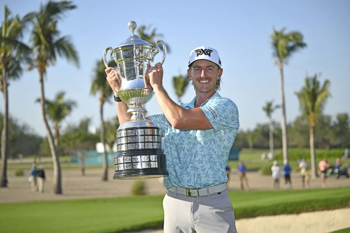 Jake Knapp of the United States holds the champions trophy during the award ceremony of the Mexico Open in Puerto Vallarta, on Feb. 25. (Orlando Ramirez/Getty Images)