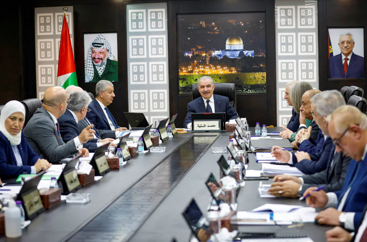 Palestinian Prime Minister Mohammad Shtayyeh convenes a cabinet meeting in Ramallah, West Bank, Palestine, on Feb. 26, 2024. (Mohammed Torokman/Reuters)