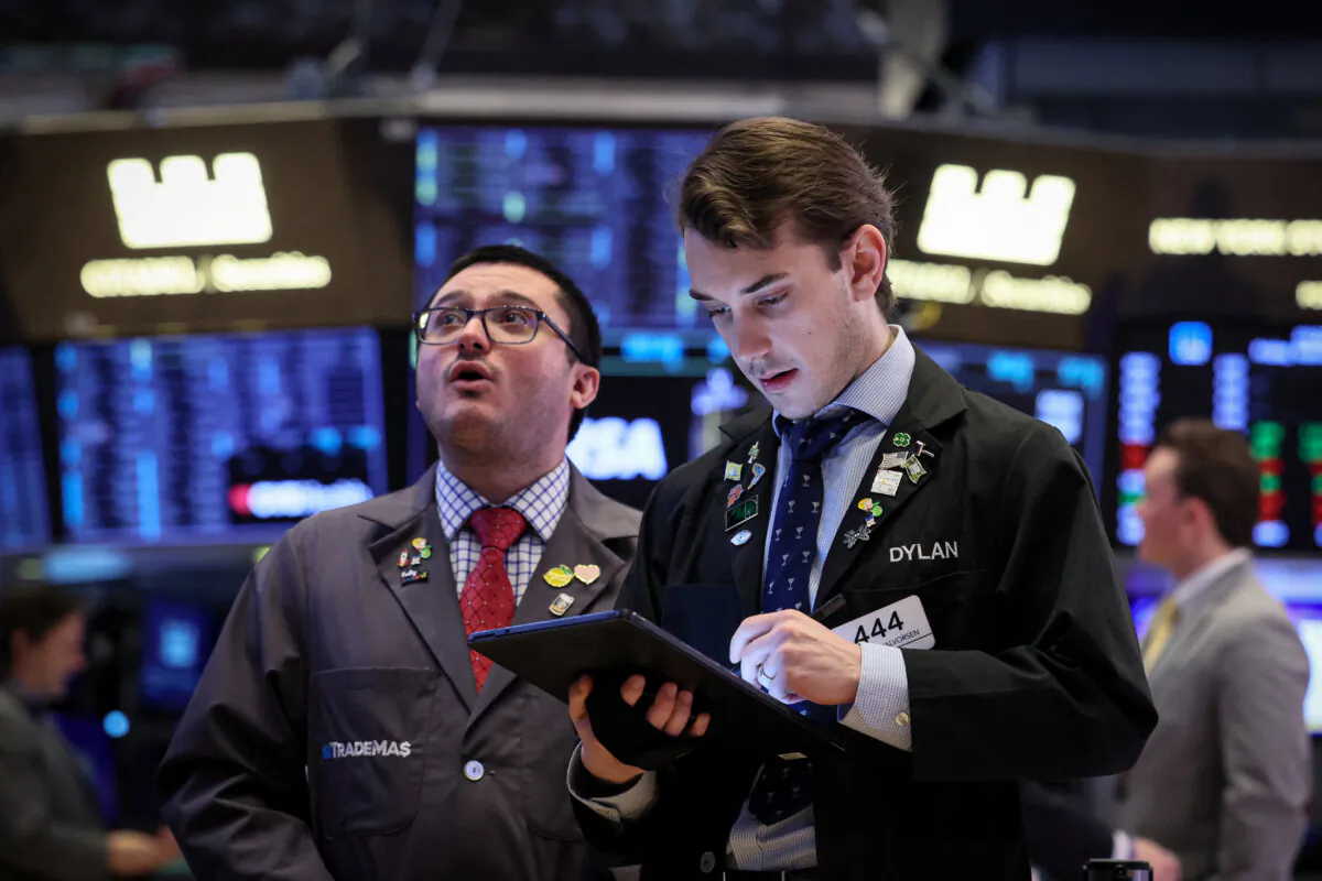 Traders work on the floor at the New York Stock Exchange (NYSE) in New York City on Feb. 23, 2024. (Brendan McDermid/Reuters)