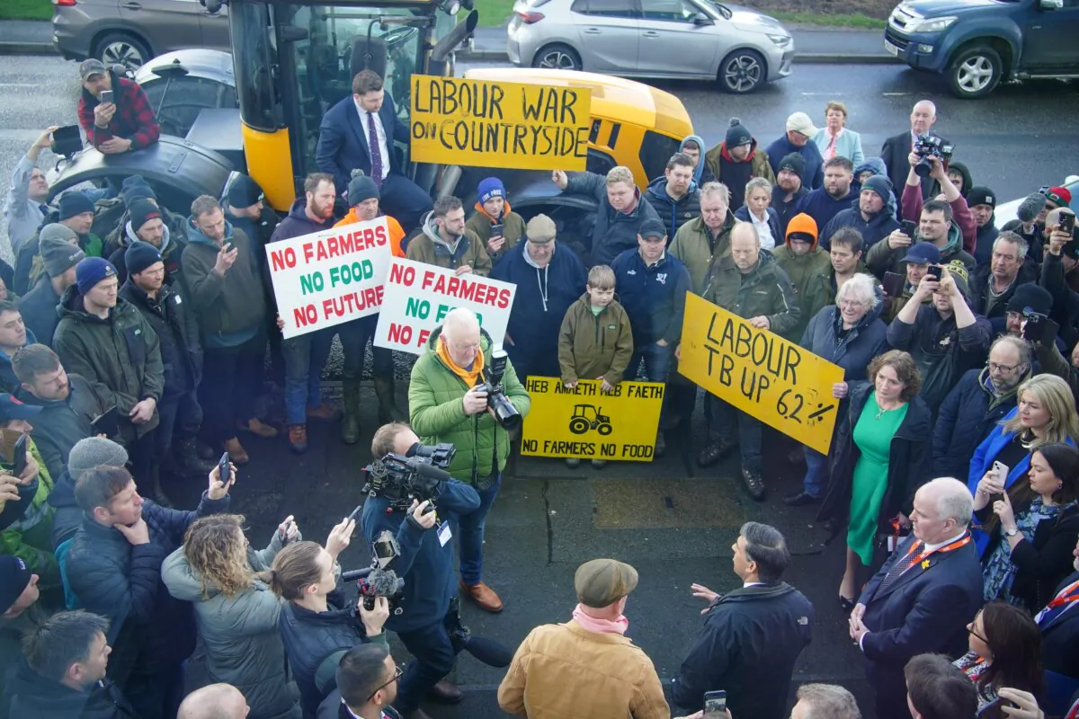 Prime Minister Rishi Sunak speaking with farmers after he delivered a speech at the Welsh Conservatives Conference 2024, at Venue Cymru in Llandudno, North Wales, on Feb. 23, 2024. (PA)