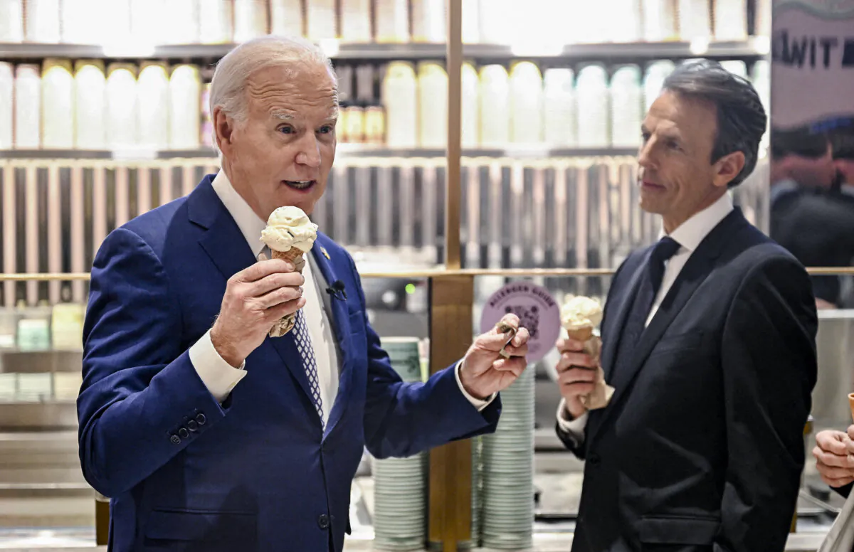 President Joe Biden speaks with host Seth Meyers as they enjoy an ice cream at Van Leeuwen Ice Cream after taping an episode of "Late Night with Seth Meyers" in New York City on Feb. 26, 2024. (Jim Watson/AFP)