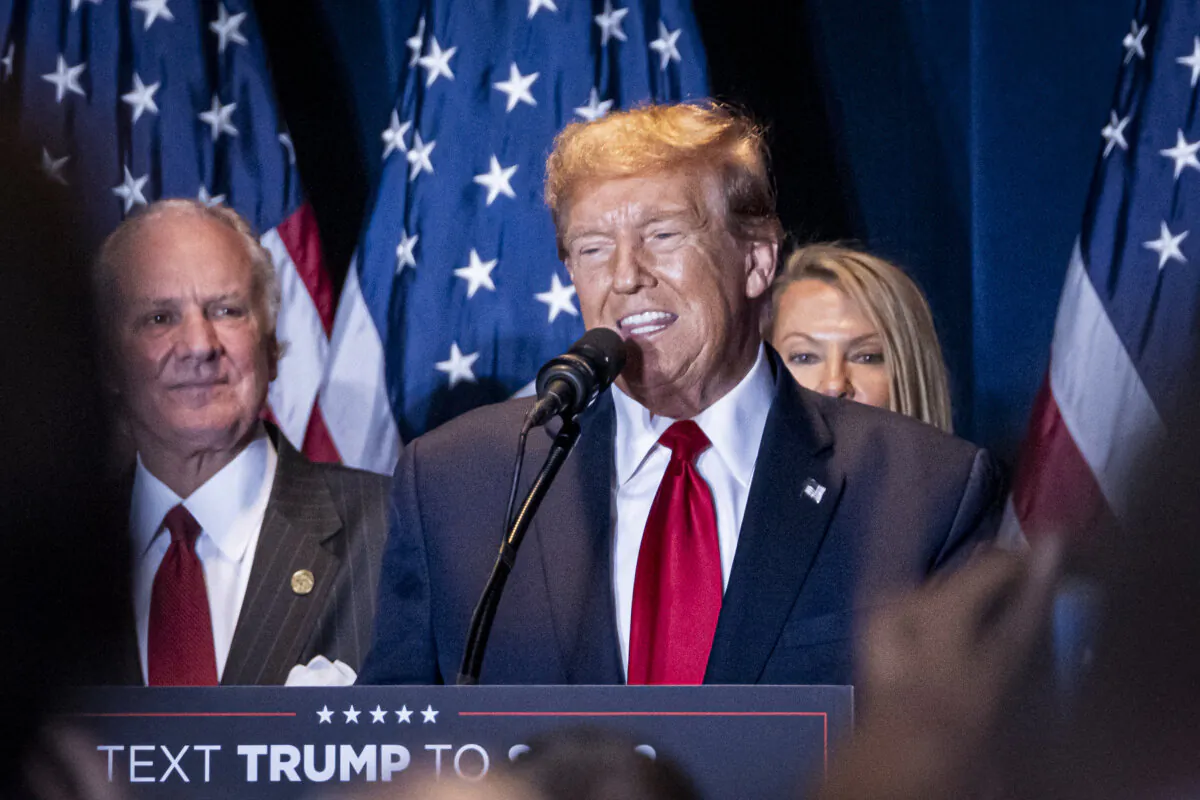 Former President Donald Trump takes the stage at the South Carolina State Fairgrounds in Columbia, S.C., on Feb. 24, 2024. (Madalina Vasiliu/The Epoch Times)