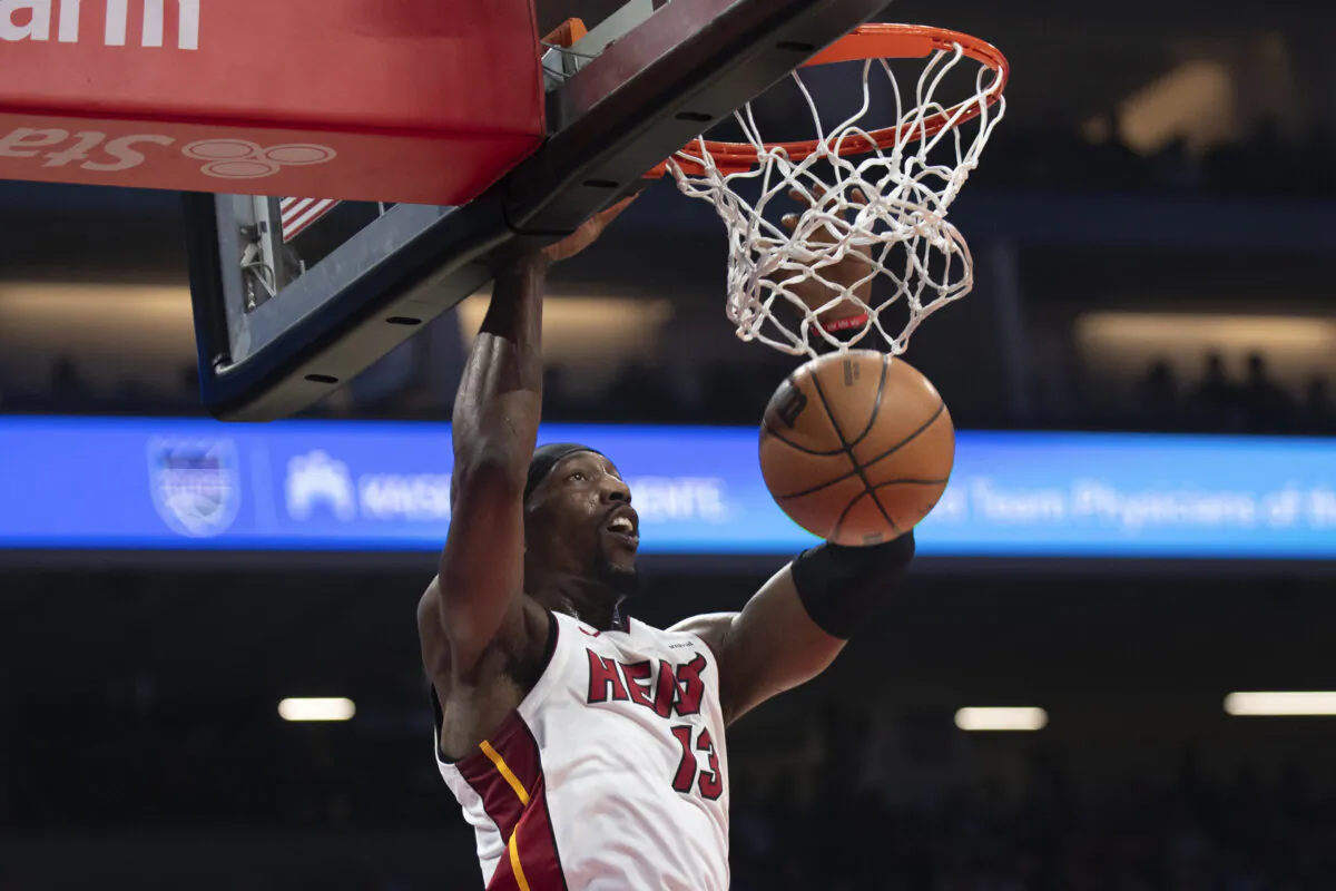 Miami Heat center Bam Adebayo scores in the first quarter of an NBA basketball game against the Sacramento Kings in Sacramento, Calif., on Feb. 26, 2024. (José Luis Villegas/AP Photo)
