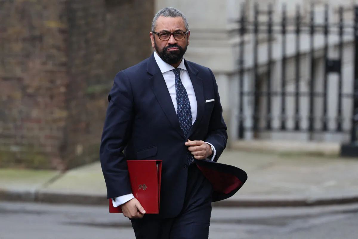 Britain's Home Secretary James Cleverly makes his way to 10 Downing Street in central London on Feb. 19, 2024. (Adrian Dennis/AFP via Getty Images)