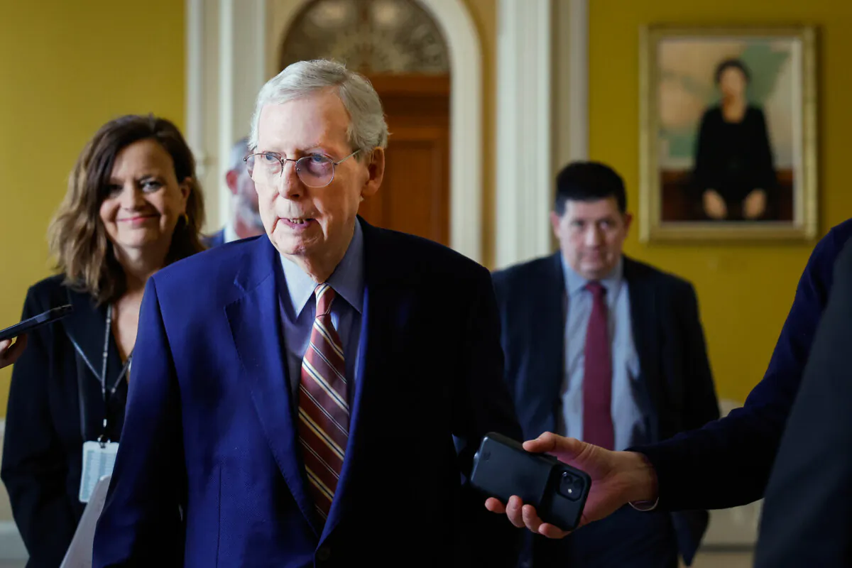 U.S. Senate Minority Leader Mitch McConnell (R-Ky.) is followed by reporters as he leaves the office of Majority Leader Chuck Schumer (D-N.Y.) at the Capitol Building in Washington on Feb. 26, 2024. (Anna Moneymaker/Getty Images)