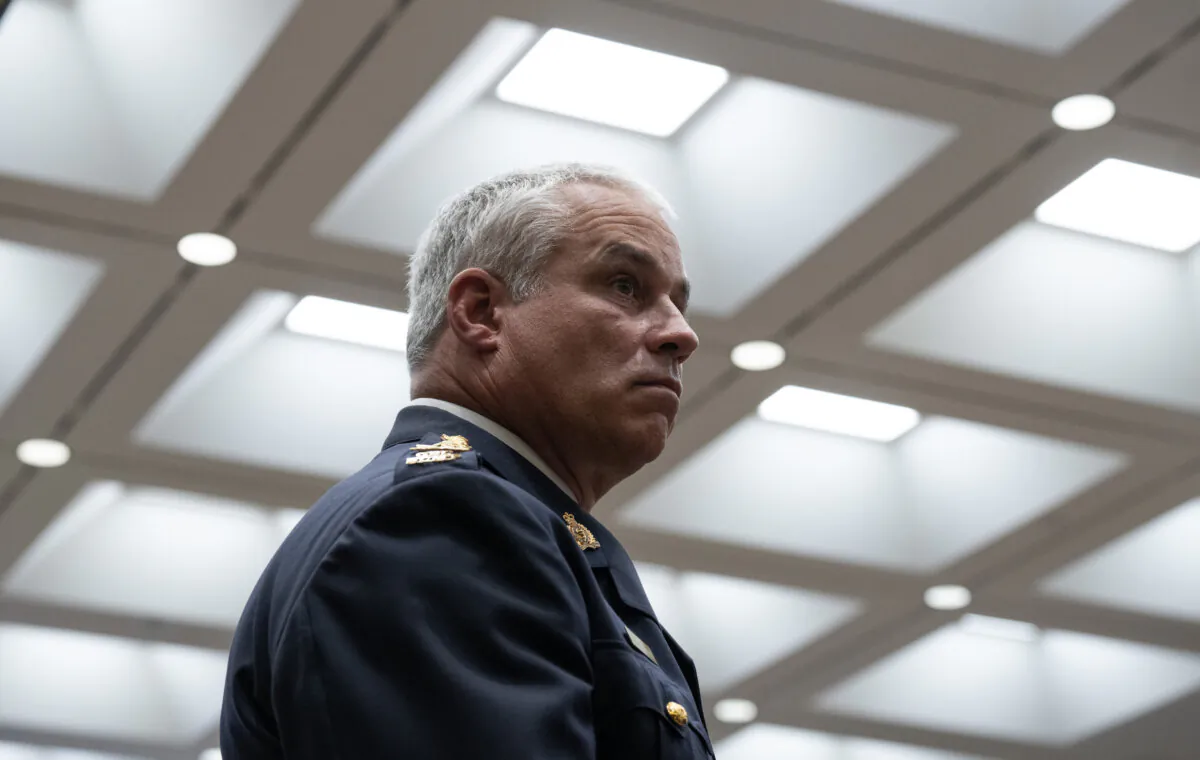 RCMP Commissioner Mike Duheme waits to appear before the House of Commons Access to Information, Privacy and Ethics committee in Ottawa, on Feb. 27, 2024. (The Canadian Press/ Adrian Wyld)