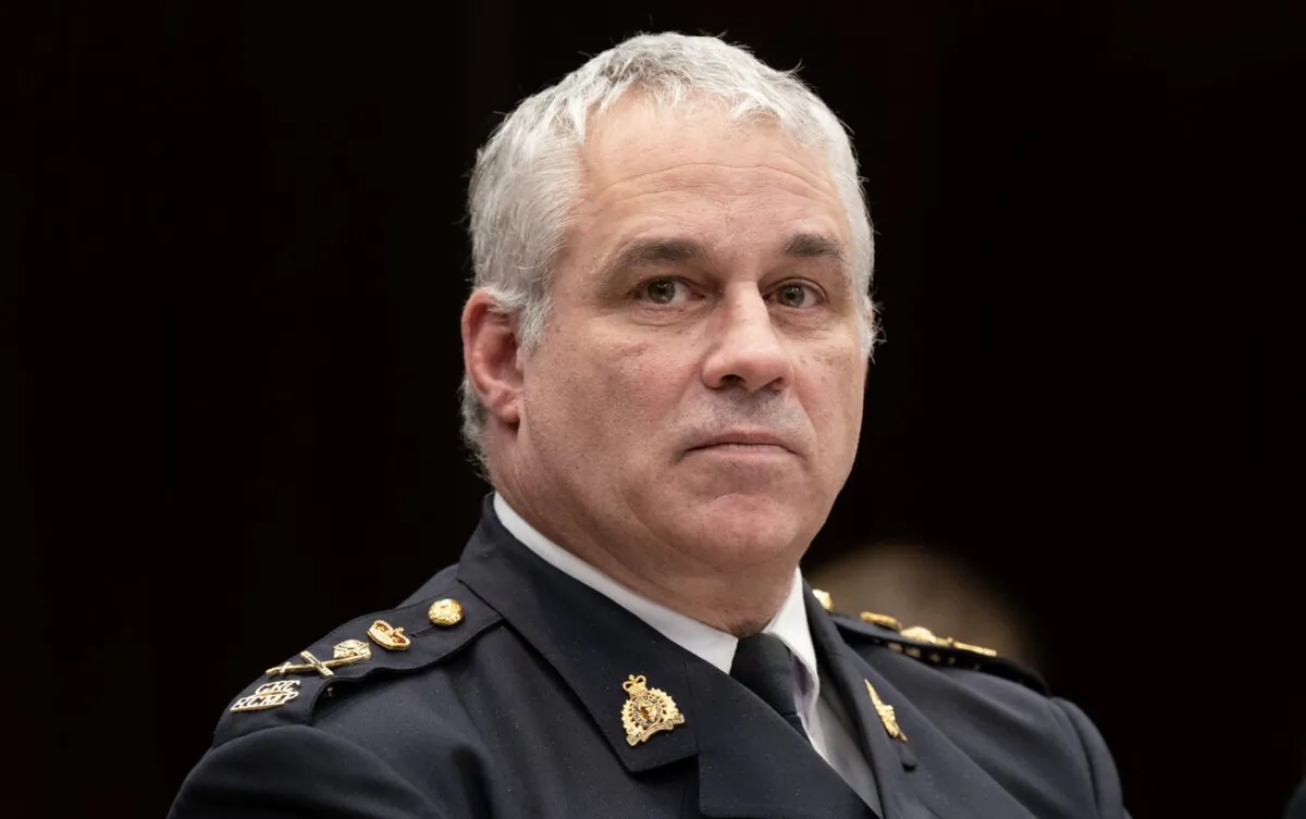 RCMP Commissioner Mike Duheme waits to appear before the House of Commons Access to Information, Privacy and Ethics committee in Ottawa. (The Canadian Press/Adrian Wyld)
