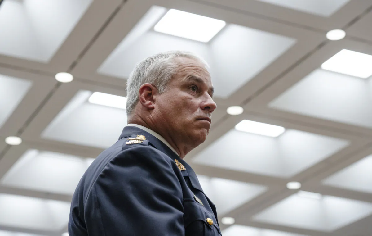 RCMP Commissioner Mike Duheme waits to appear before the House of Commons Access to Information, Privacy and Ethics committee in Ottawa, on Feb. 27, 2024. (The Canadian Press/ Adrian Wyld)