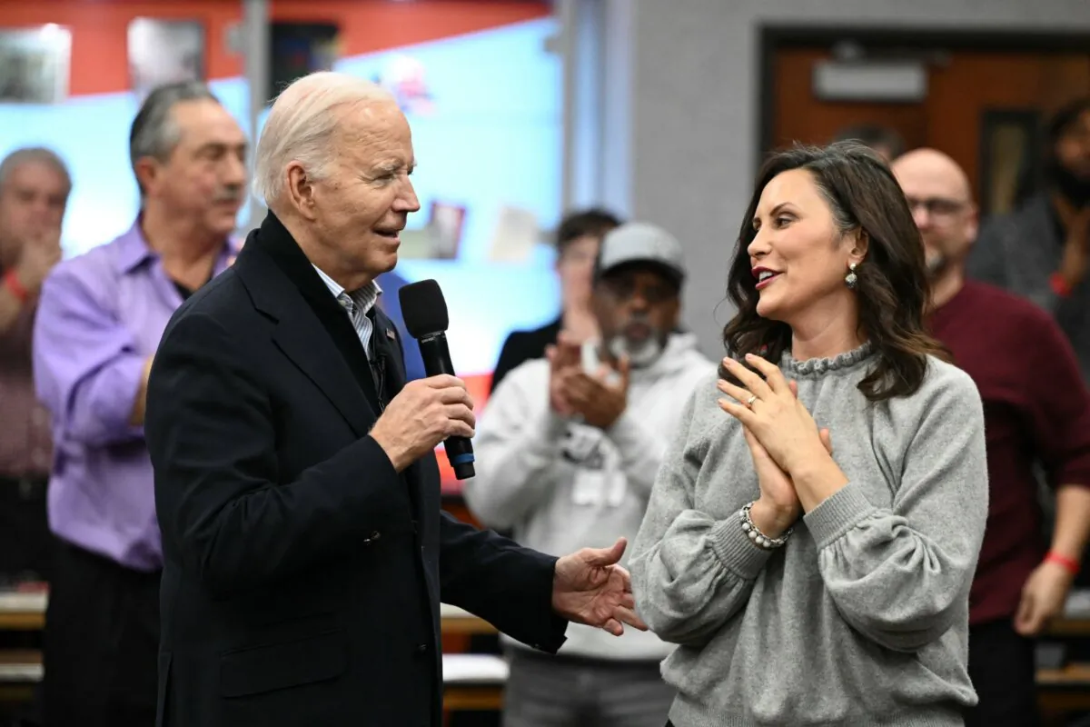 President Joe Biden speaks alongside Michigan Gov. Gretchen Whitmer (R) during a visit to a United Auto Workers (UAW) phone bank in the metropolitan Detroit area on Feb. 1, 2024. (Mandel Ngan/AFP via Getty Images)
