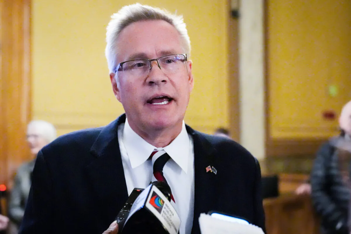 John Rust speaks with reporters following oral arguments before the Indiana Supreme Court, on Feb. 12, 2024. (Michael Conroy/AP Photo)