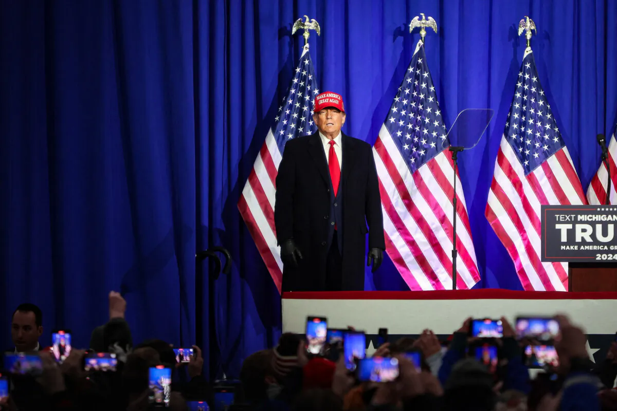Former President and 2024 presidential hopeful Donald Trump pauses while speaking during a "Get Out the Vote" rally in Waterford Township, Mich., on Feb. 17, 2024. (Alex Wroblewski/AFP via Getty Images)