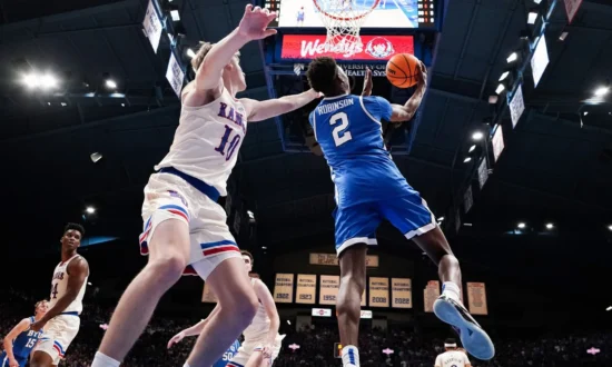 Top 25 Roundup: BYU Halts No. 7 Kansas’ 19-Game Home Win Streak