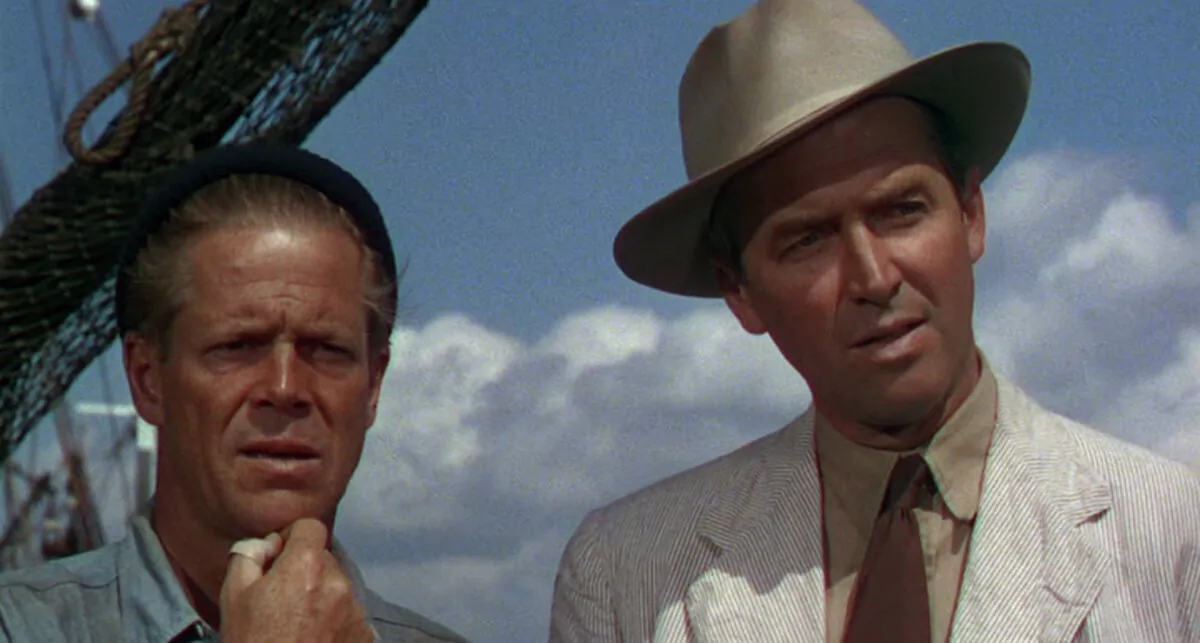 Steve (James Stewart, R) and Gambi (Dan Duryea) embody the American can-do spirit in “Thunder Bay.” (Universal Pictures)