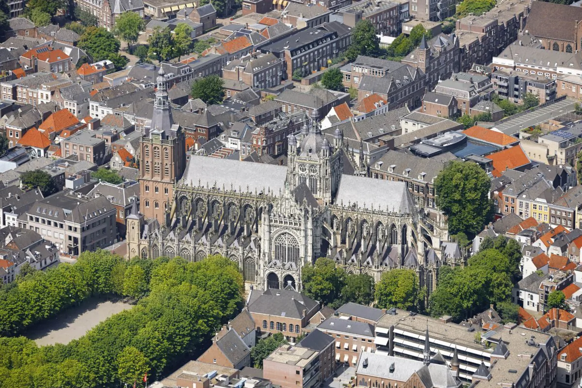 With its richly sculpted exterior and double row of flying buttresses, St. John’s Cathedral is unmistakably late Gothic. The church is just over 377 feet long and 203 feet wide, featuring a white, polished façade with carved statues, gargoyles, window reliefs, and an impressive set of flying buttresses decorated with more than 95 Dutch figures dating from the 19th century. On the side, the simple red brick Romanesque tower contrasts with the building’s decorative Gothic style. (R. de Bruijn_Photography/Shutterstock)