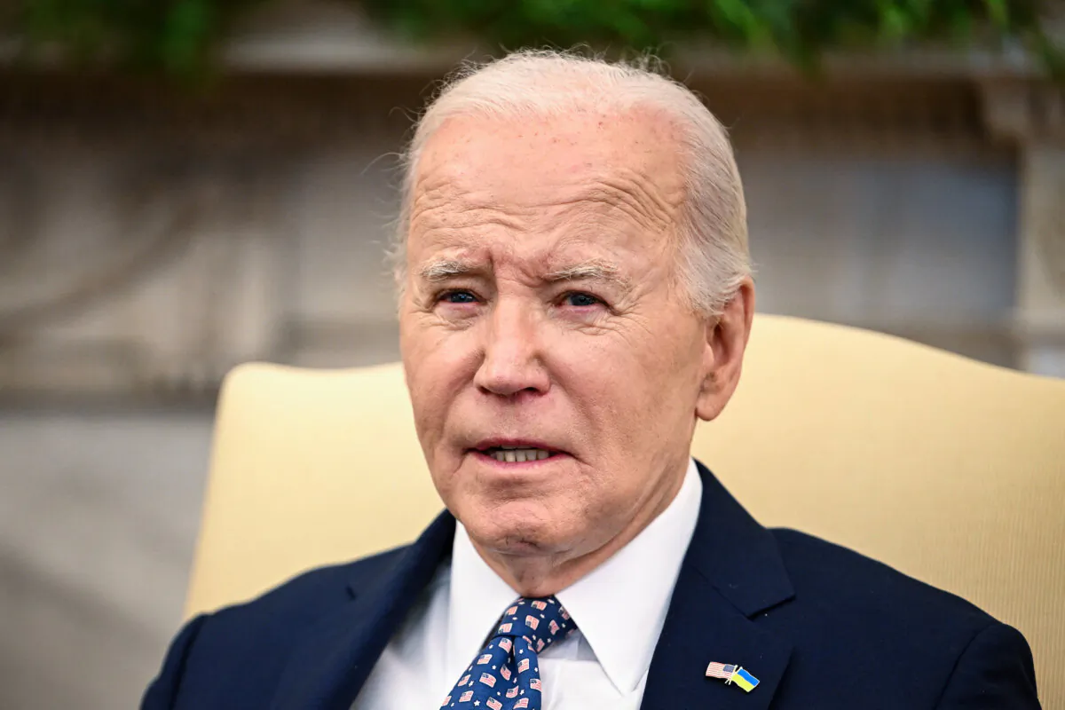 President Joe Biden attends a meeting with Congressional leadership in the Oval Office of the White House on Feb. 27, 2024. (Jim Watson/AFP via Getty Images)