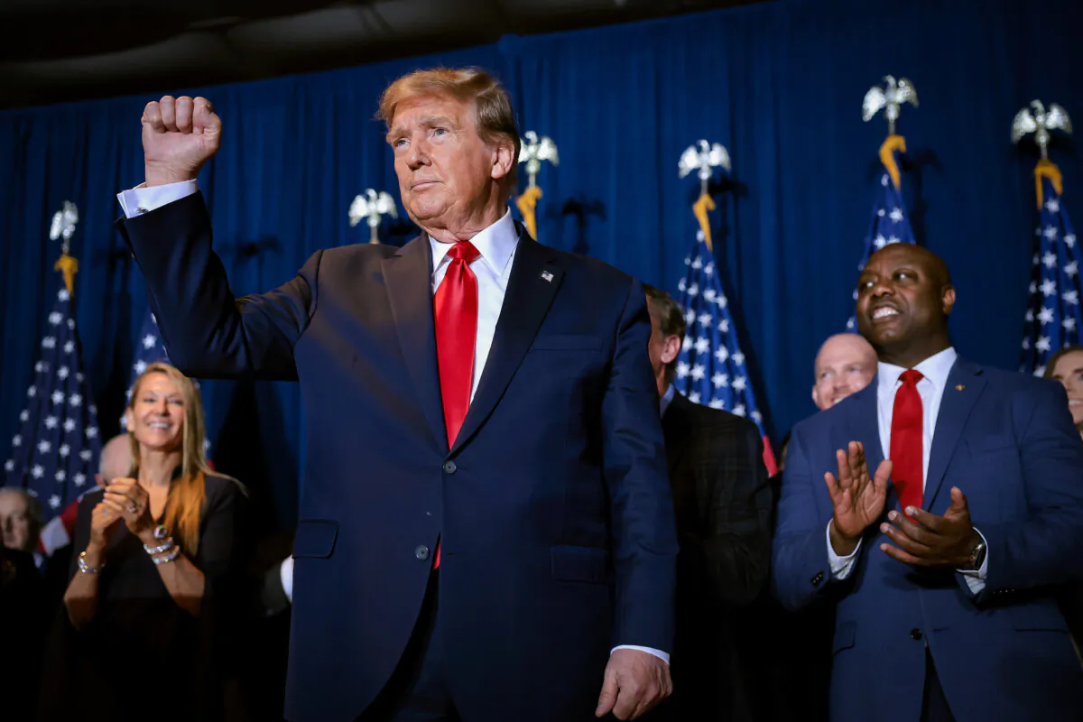 Republican presidential candidate and former President Donald Trump gestures to supporters during an election night watch party at the State Fairgrounds in Columbia, S.C., on Feb. 24, 2024. (Win McNamee/Getty Images)