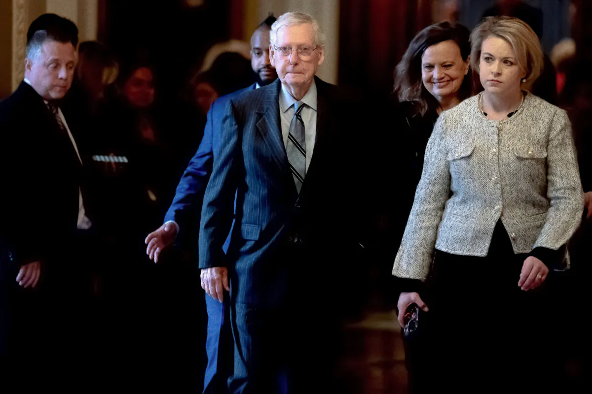Senate Minority Leader Mitch McConnell (R-Ky.) departs the Senate chamber in Washington on Feb. 28, 2024. (Nathan Howard/Getty Images)