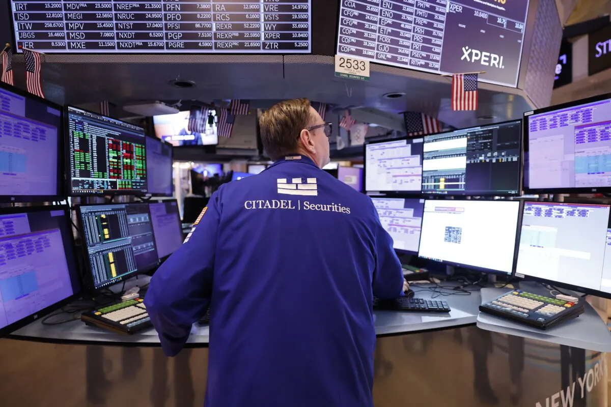 Traders work on the floor of the New York Stock Exchange during morning trading in New York, on Feb. 23, 2024. (Michael M. Santiago/Getty Images)