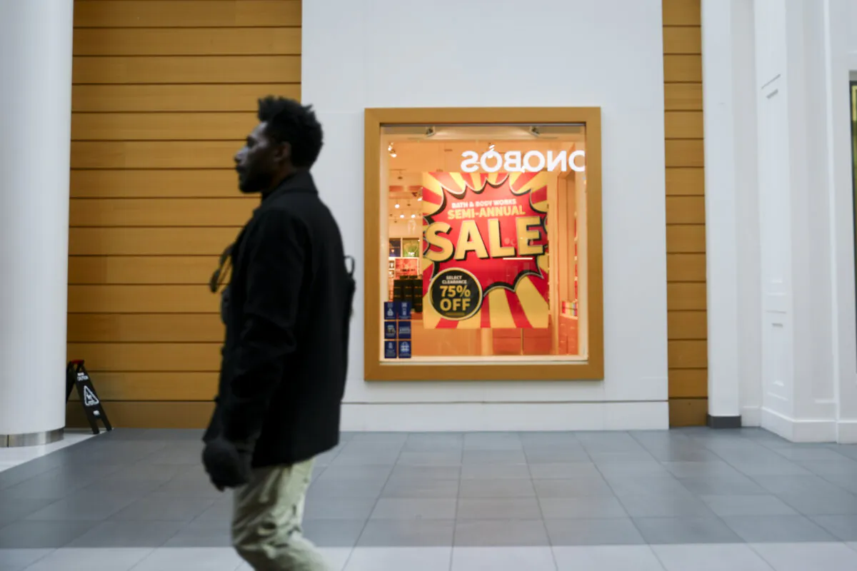 A sales advertisement at a shop in the Fashion Centre at Pentagon City shopping mall in Arlington, Va., on Jan. 3, 2024. (Madalina Vasiliu/The Epoch Times)