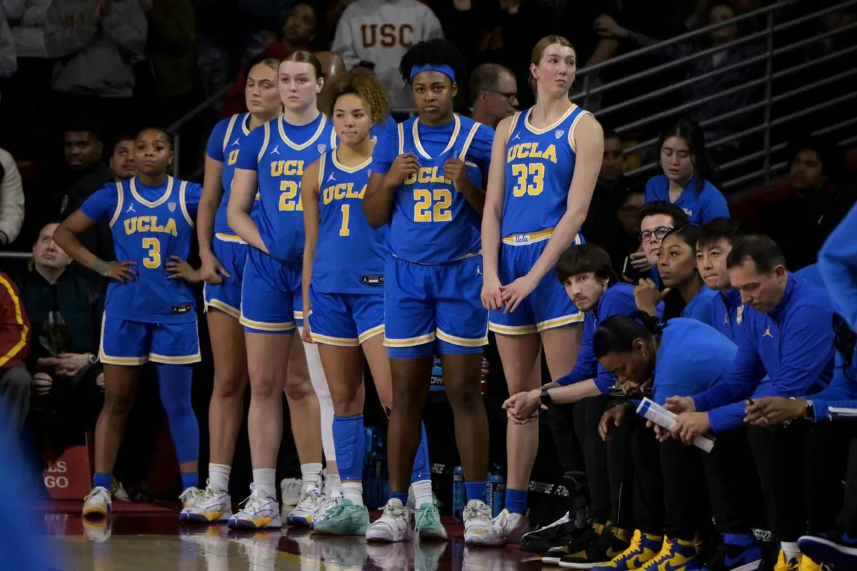 UCLA Bruins guard Londynn Jones (3), forward Angela Dugalic (32), forward Lina Sontag (21), guard Kiki Rice (1), forward Christeen Iwuala (22) and forward Amanda Muse (33) look on from the bench in the final seconds of the game in Los Angeles on  Jan 14, 2024. (Jayne Kamin-Oncea/USA TODAY Sports via Field Level Media)