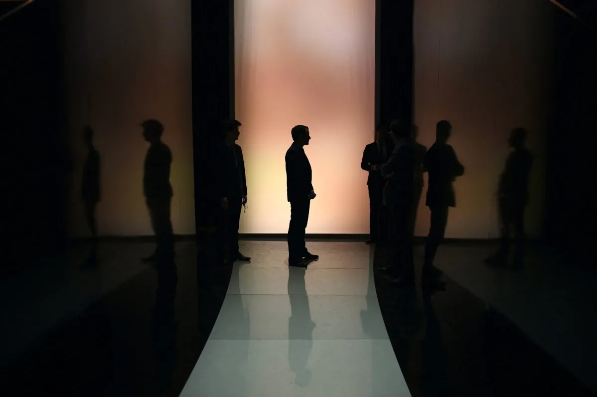 Political candidates stand prior to a debate in a file photo. (Eliot Blondet/Pool/AFP/AFP via Getty Images)