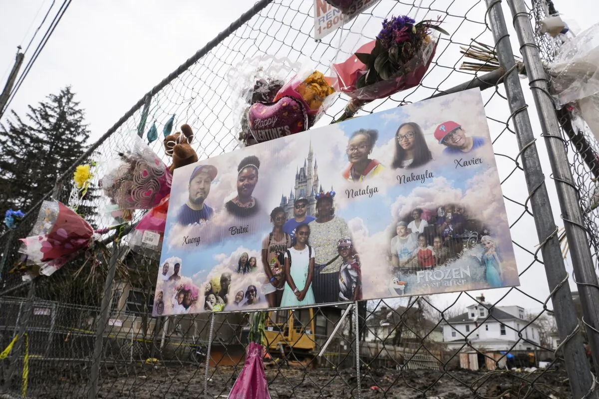 A makeshift memorial at the scene of a shootout and house fire that killed six members of an extended family in East Lansdowne, Pa., on Feb. 28, 2024. (Matt Rourke/AP Photo)