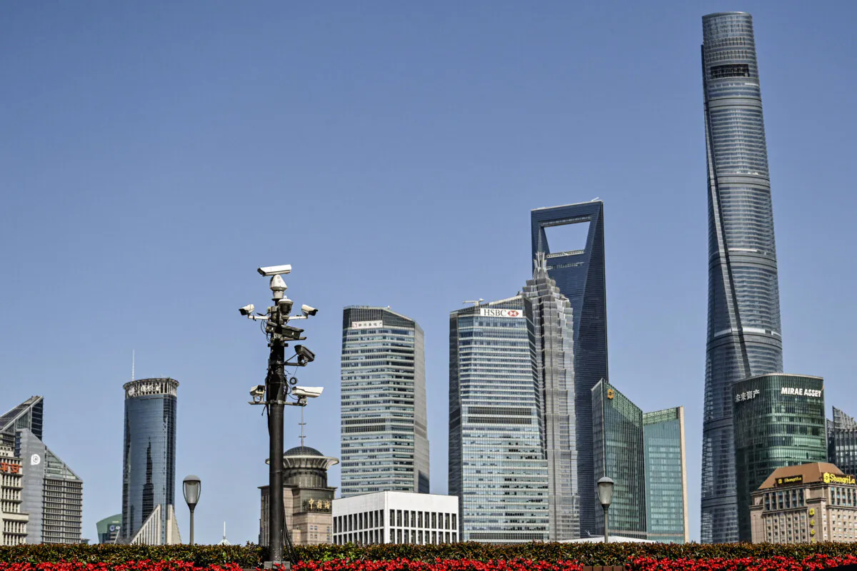 A tower of security cameras (center L) are seen on The Bund past the Lujiazui financial district in Shanghai on May 23, 2023. (Hector Retamal/ AFP via Getty Images)