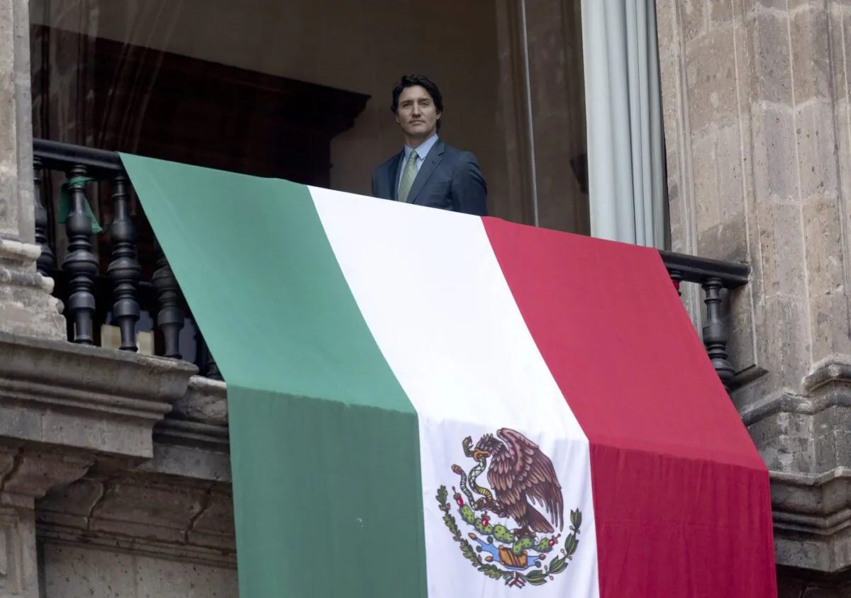 Prime Minister Justin Trudeau looks out from a balcony following a meeting with Mexican President Andres Manuel Lopez Obrador at the National Palace, in Mexico City, Mexico, Jan.11, 2023. (The Canadian Press/Adrian Wyld)