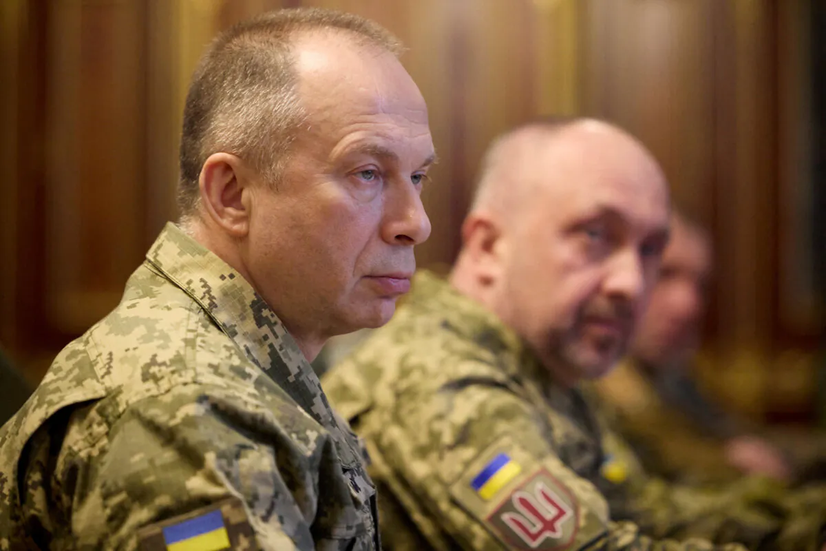 Commander in Chief of the Ukrainian Armed Forces Colonel General Oleksandr Syrskyi attends a meeting with Ukraine's President Volodymyr Zelenskyy and newly appointed top military commanders, in Kyiv, Ukraine, on Feb. 10, 2024. (Ukrainian Presidential Press Service/Handout via Reuters)